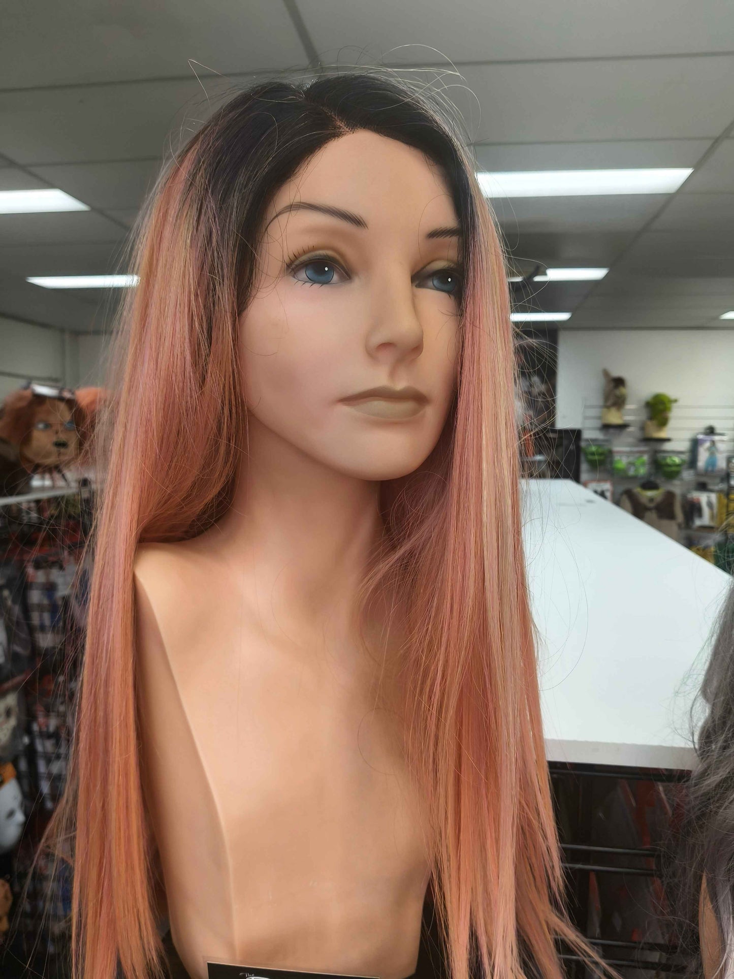 Rosey pink curlable fibre wig