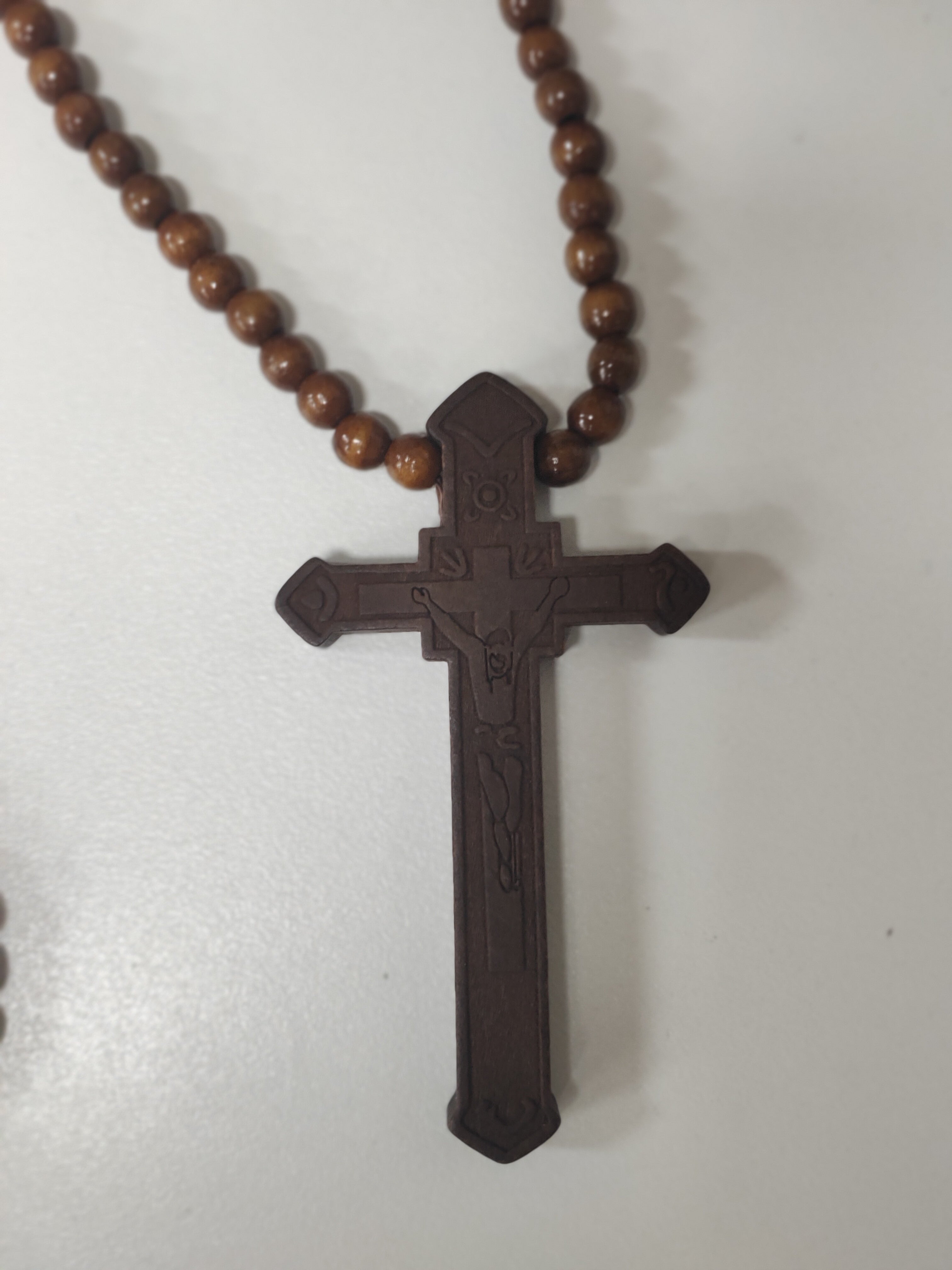 Rosary beads with wooden cross nun / pope